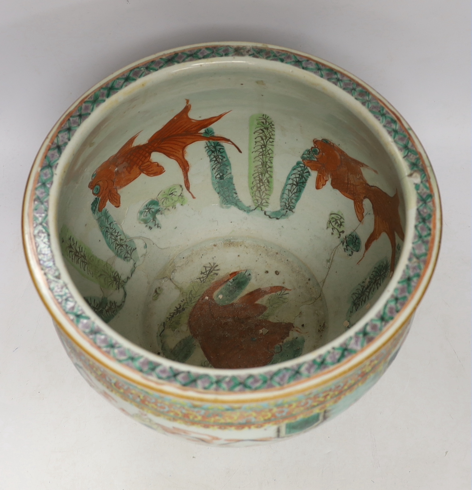 A late 19th century Chinese famille verte 'goldfish' bowl, 25cm high (restored)